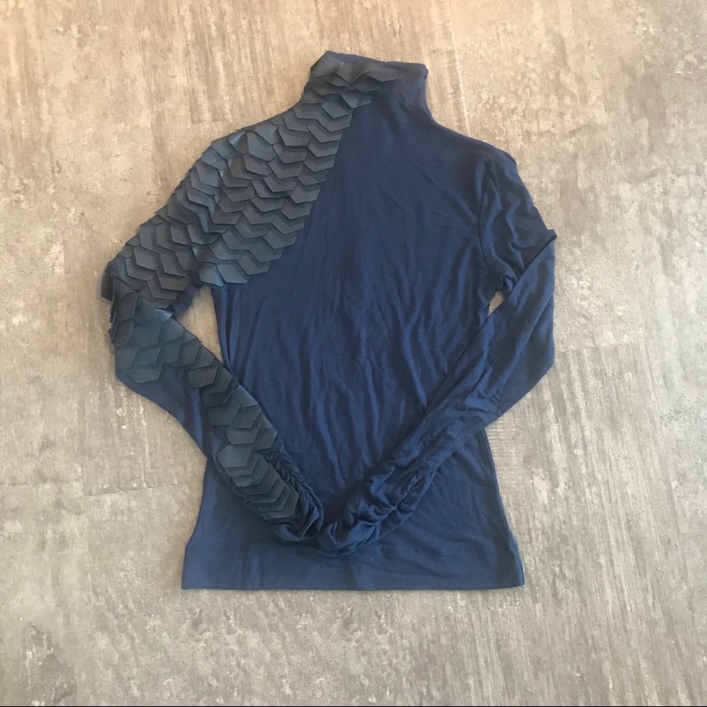 Turtleneck with leather and mesh scale detail
